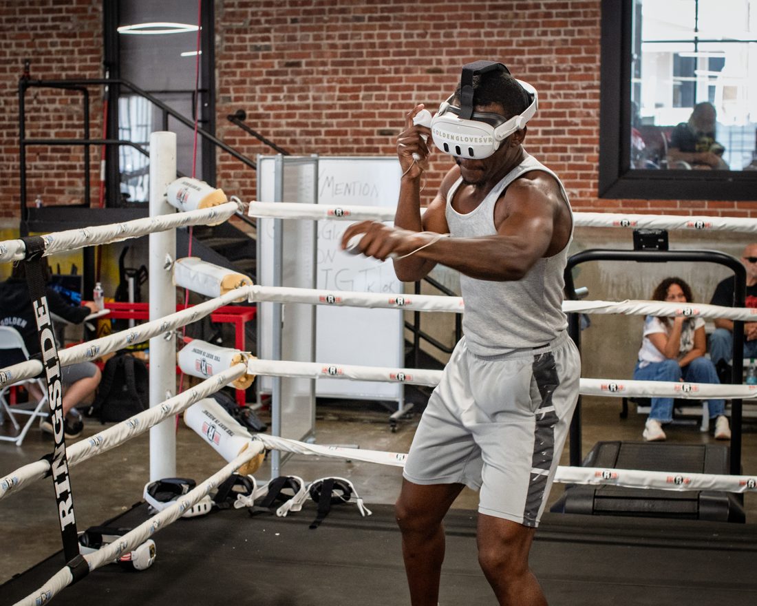 Spectators watching a Golden Gloves VR match