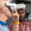 Aaron Sloan, ERVR owner, & Terrance Reed, The Engine Room boxer, by Mark Bennett testing Oculus Virtual Reality(VR) goggles 